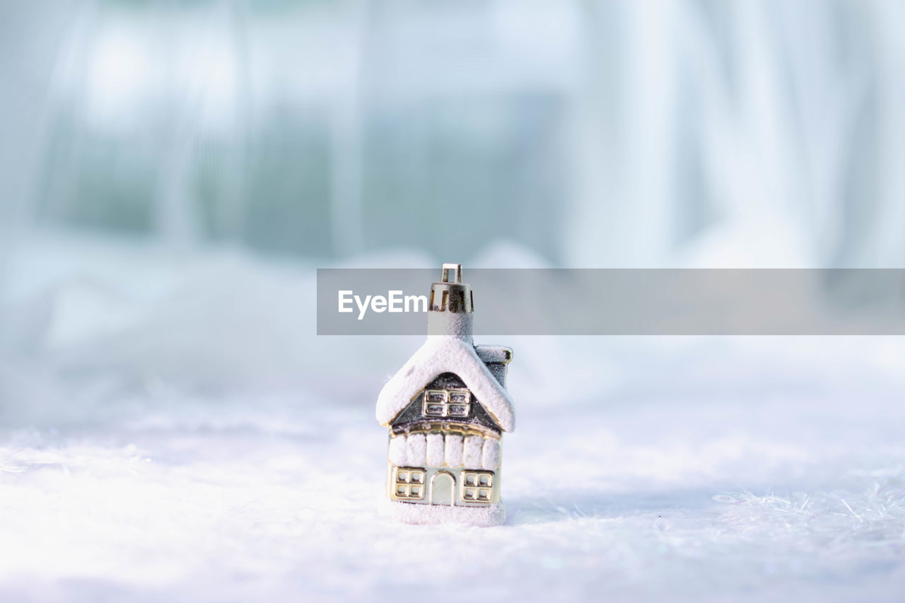 Close-up of snow covered house