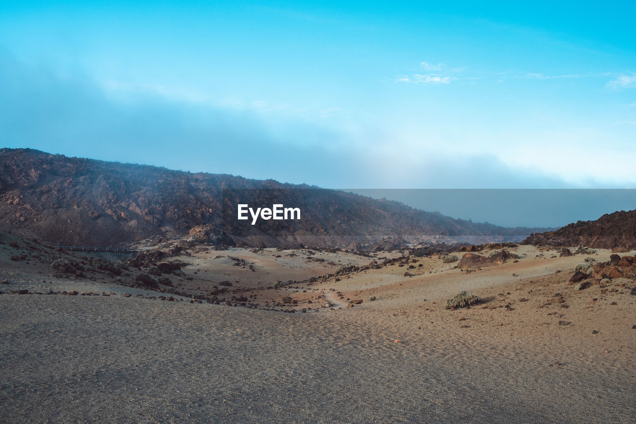 Scenic view of desert against sky