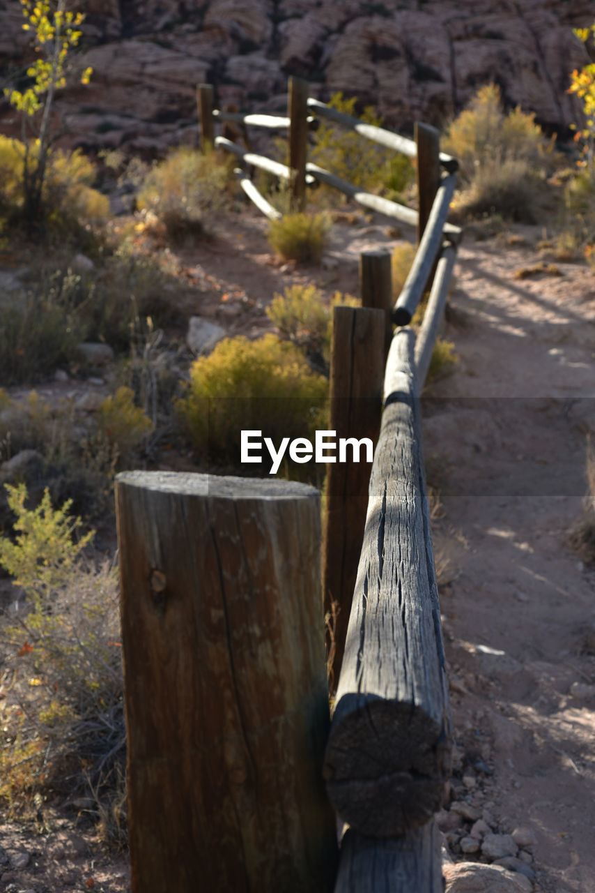 CLOSE-UP OF WOODEN POST