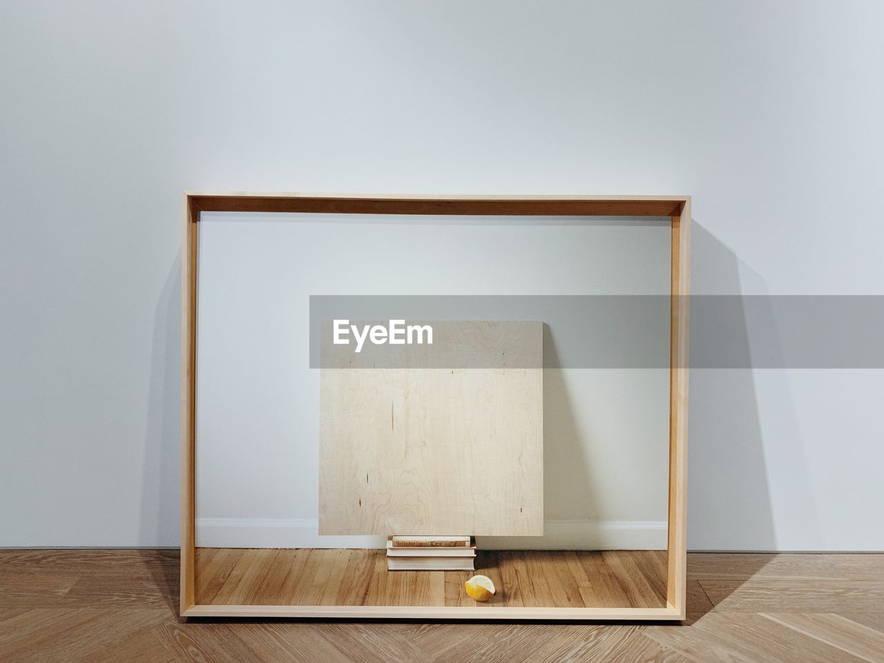 Wooden table against wall at home