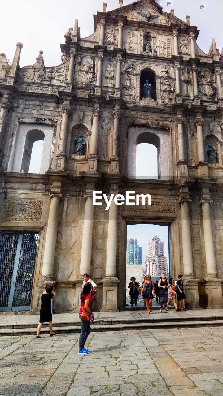 PEOPLE AT HISTORIC BUILDING