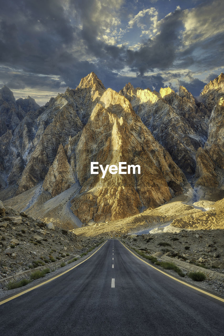 Road amidst landscape against sky