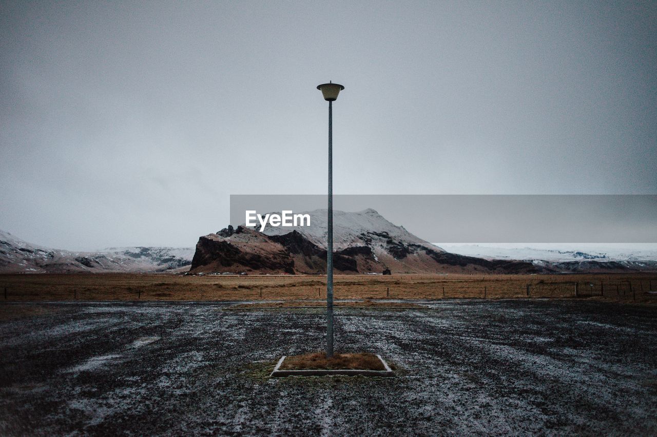 Scenic view of mountains against sky during winter