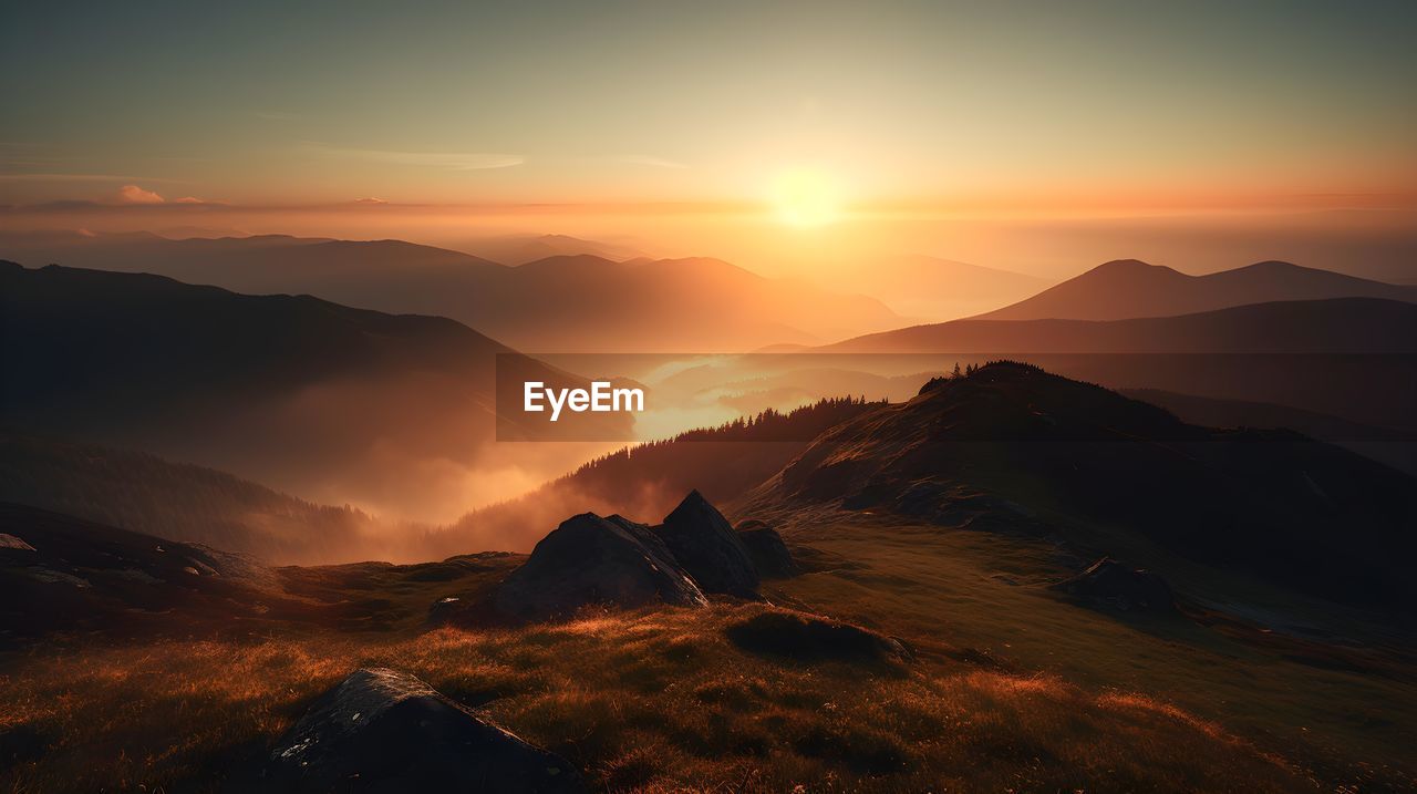 scenic view of mountains during sunset