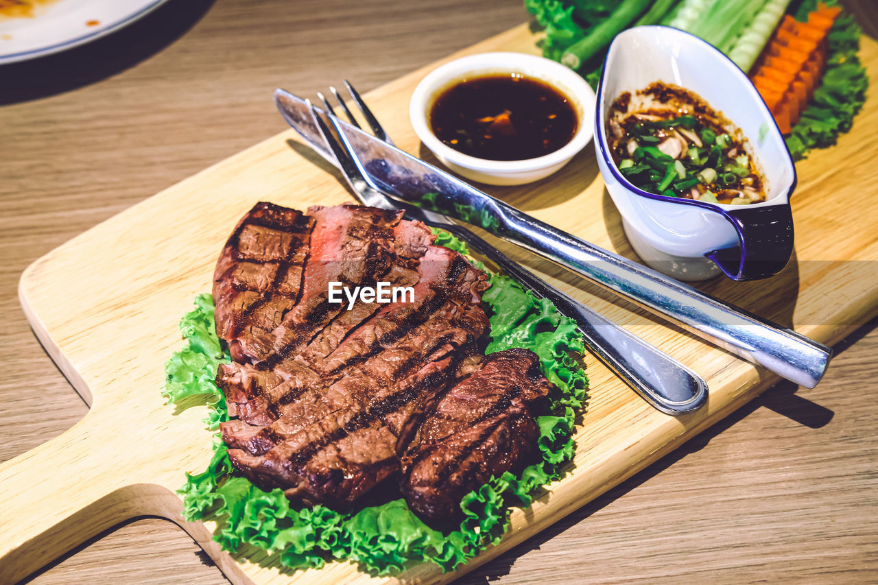 HIGH ANGLE VIEW OF MEAL SERVED ON TABLE