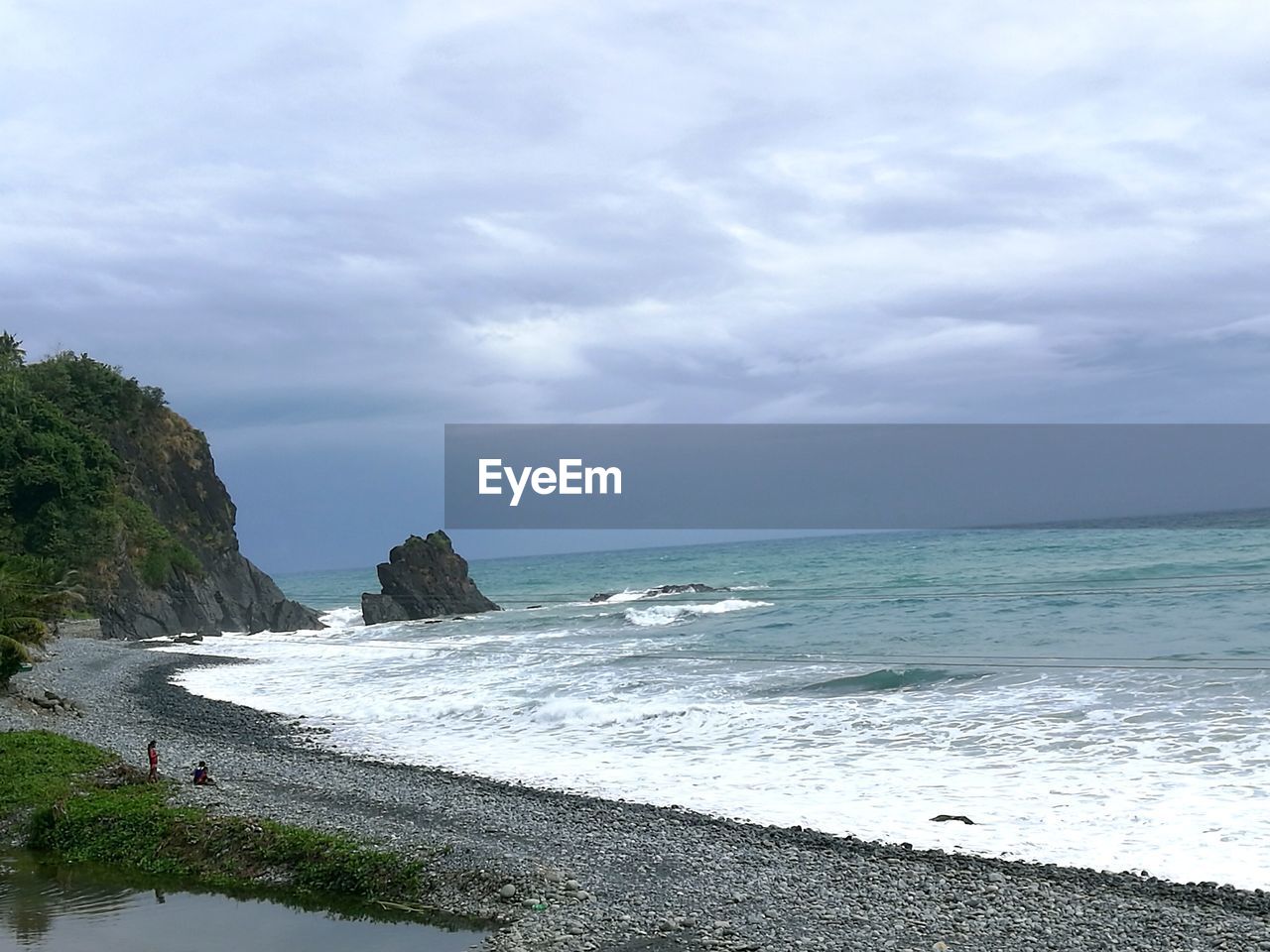 SCENIC VIEW OF BEACH BY SEA AGAINST SKY