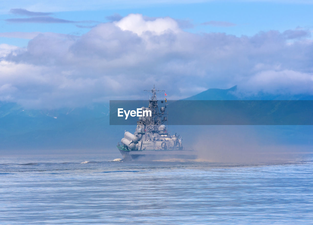 Russian warship going along the coast of kamchatka