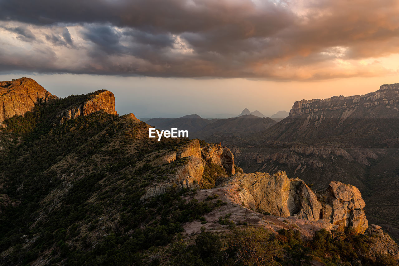 Scenic view of mountains against sky during sunset