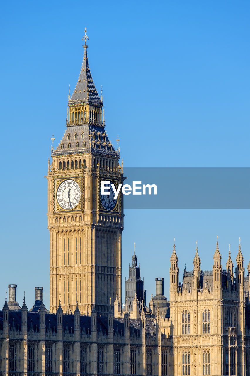 The clock tower of big ben (elizabeth tower) above palace of westminster, the houses of parliament of the united kingdom, london, england, united kingdom