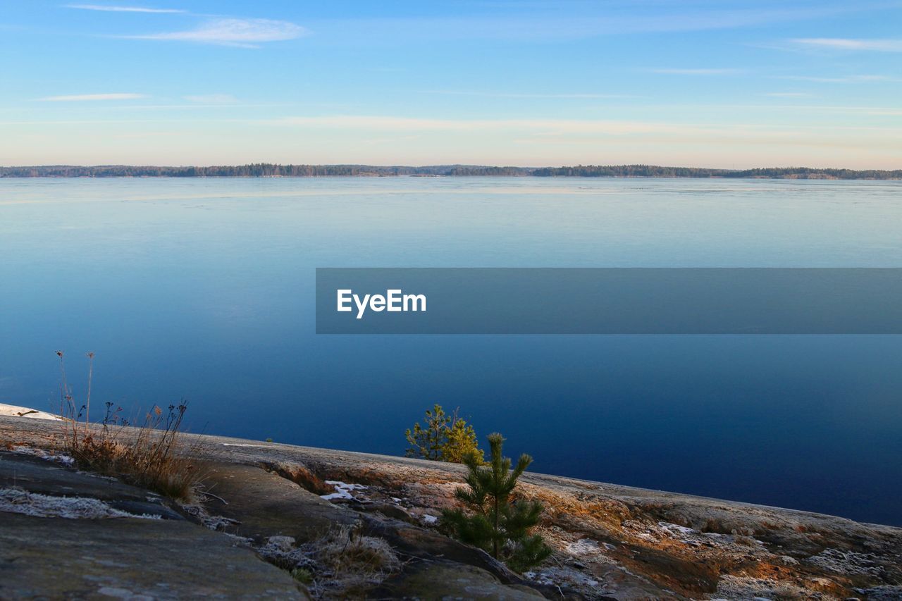 Scenic view of lake against sky