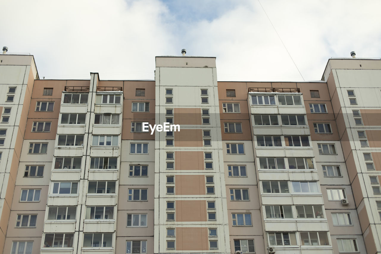 Building with windows. urban development. lots of apartment building. view of house in modern times.