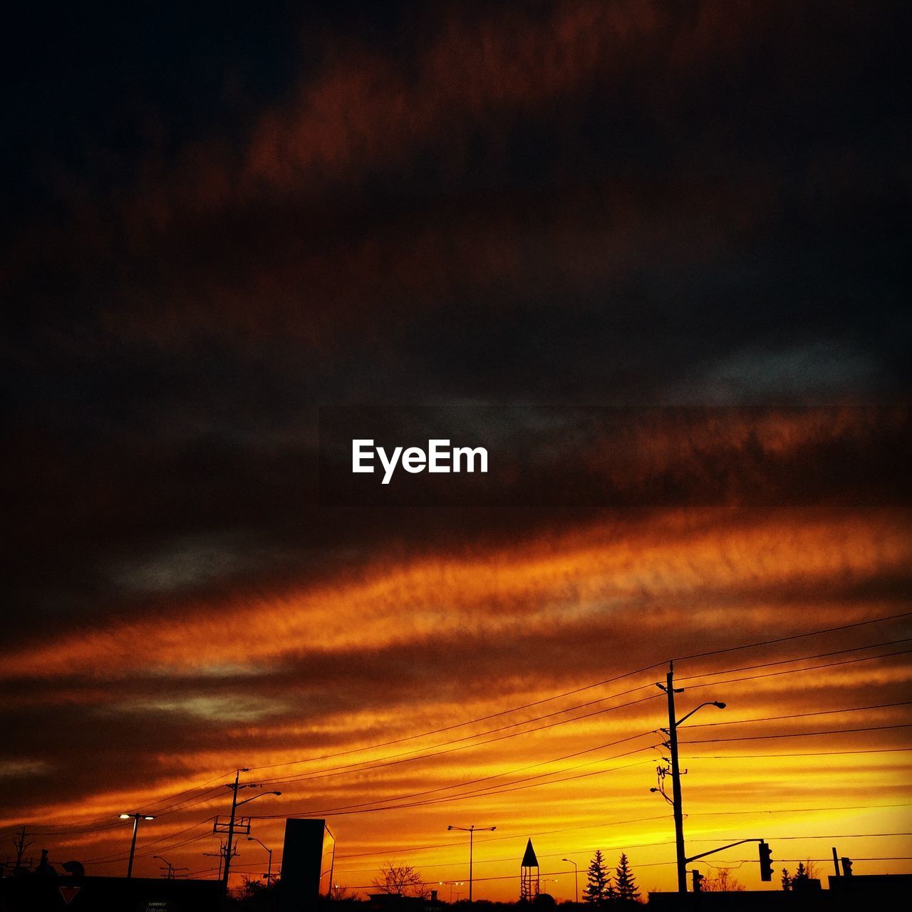 Dramatic sky over city during sunset