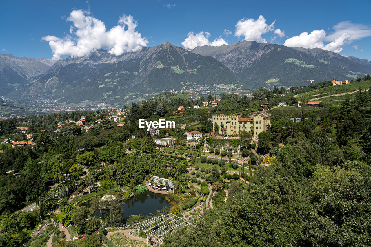 high angle view of trees and mountains against sky