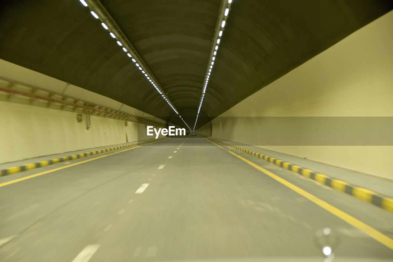 EMPTY ROAD IN TUNNEL