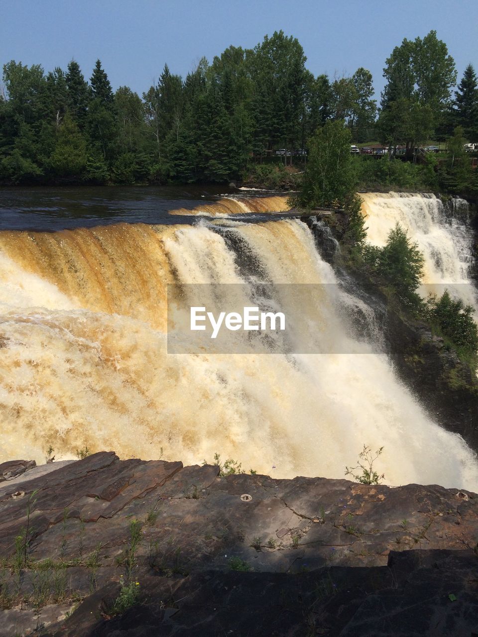 SCENIC VIEW OF WATERFALL