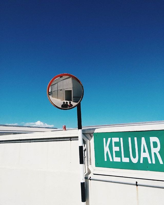 LOW ANGLE VIEW OF BUILT STRUCTURE AGAINST CLEAR BLUE SKY