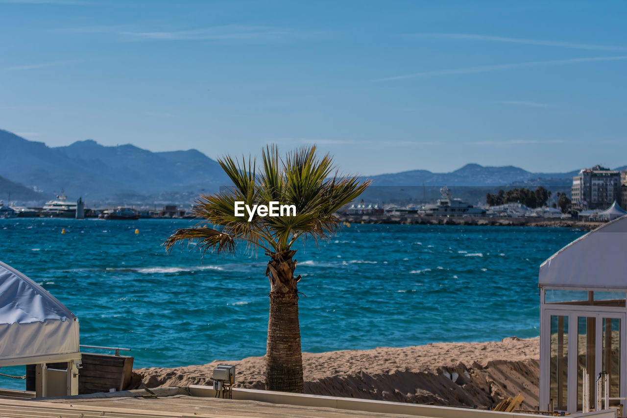 Scenic view of sea against blue sky