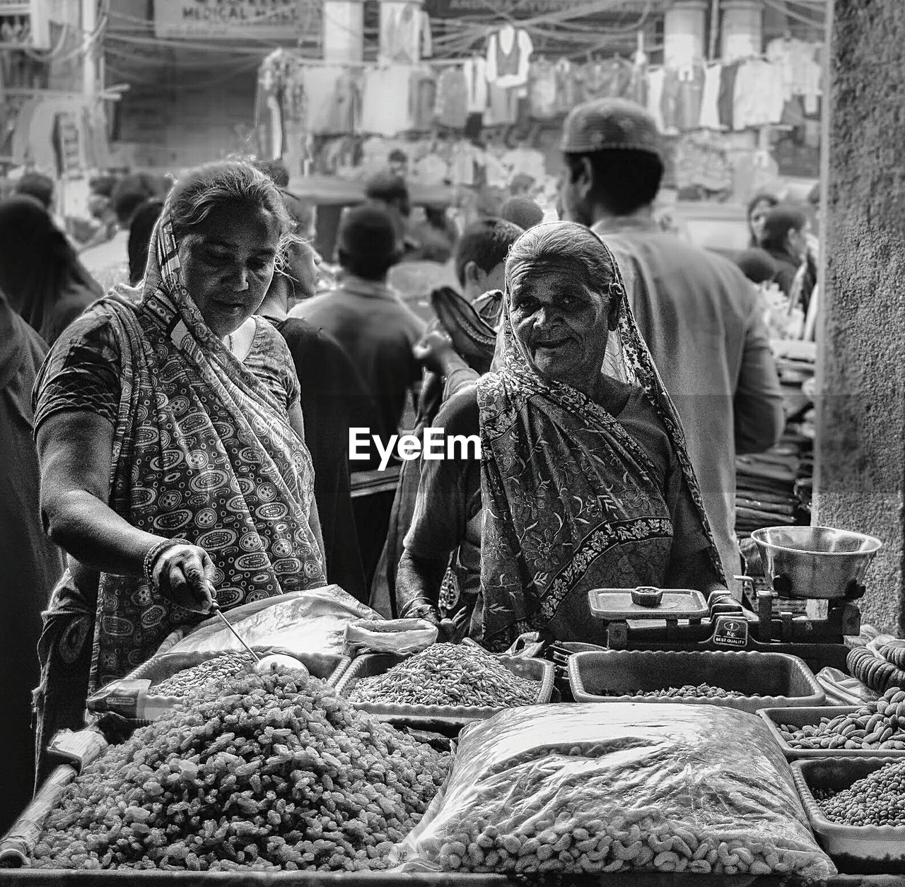 Women selling dry fruits at market