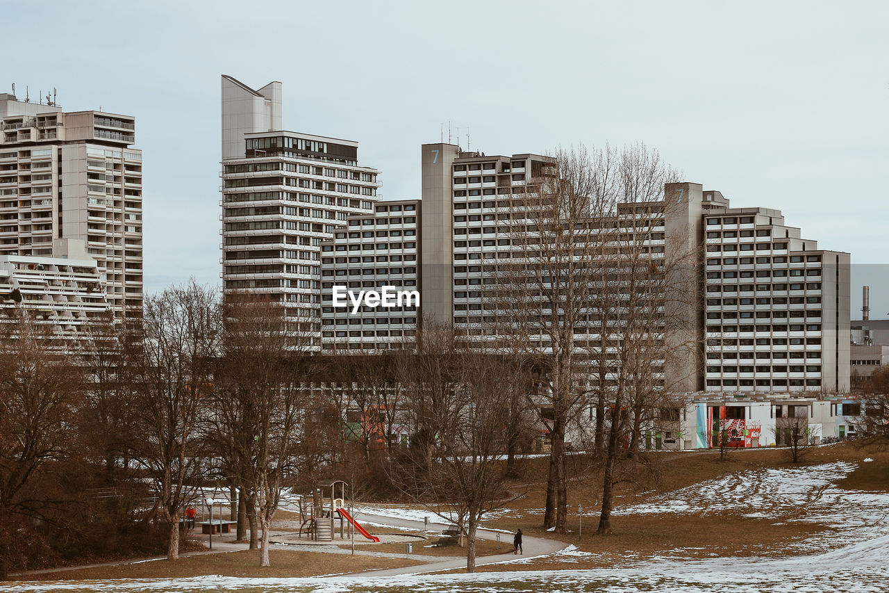 View of buildings in city against sky