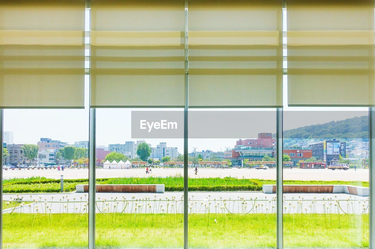 View of city through window