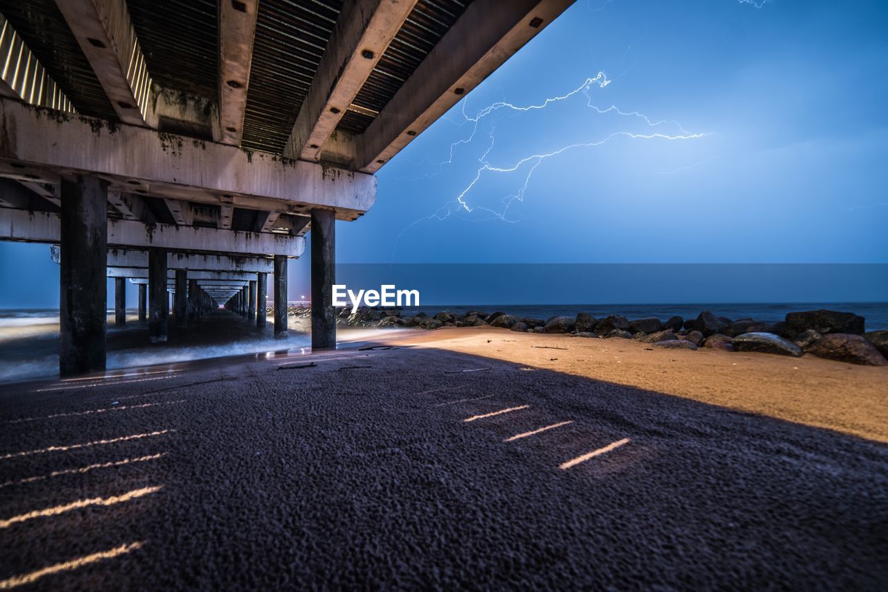 View of bridge over sea against sky