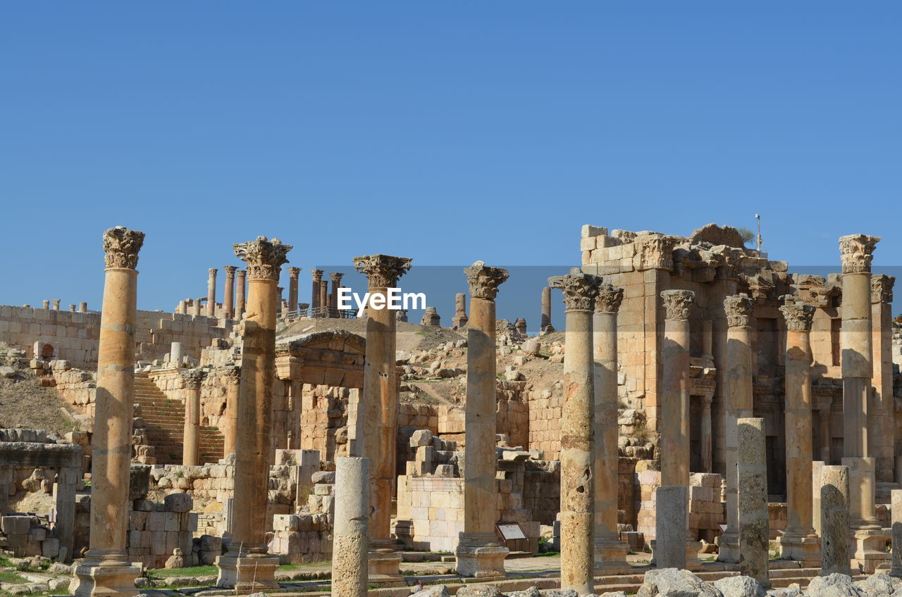 VIEW OF OLD RUIN AGAINST CLEAR BLUE SKY