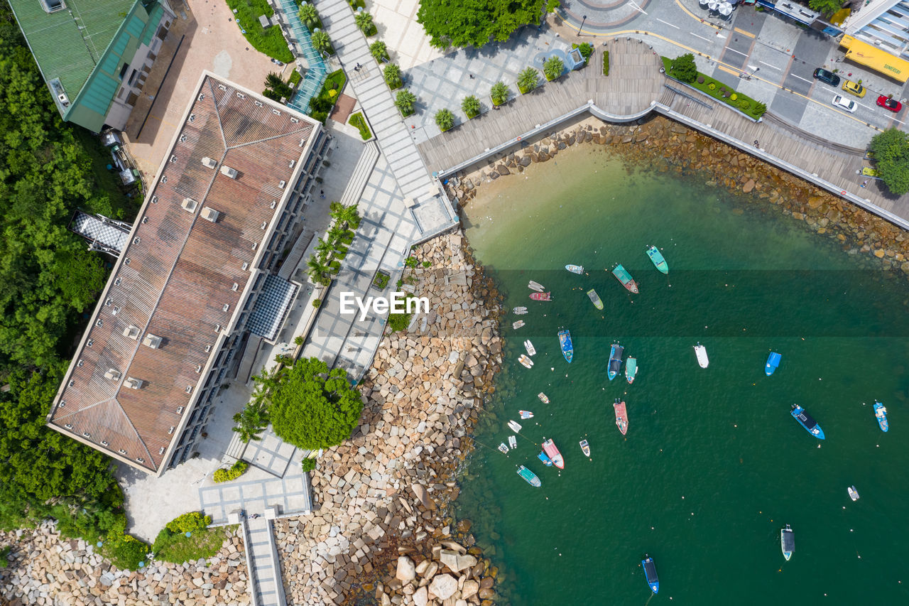 HIGH ANGLE VIEW OF SWIMMING POOL IN LAKE