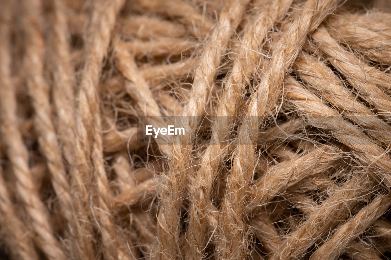 Natural jute twine, macro photography. jute thread texture. a coil of jute rope. close-up