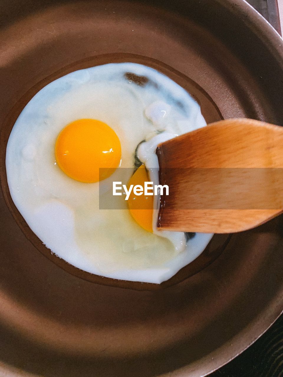 Directly above shot of sunny side up in frying pan