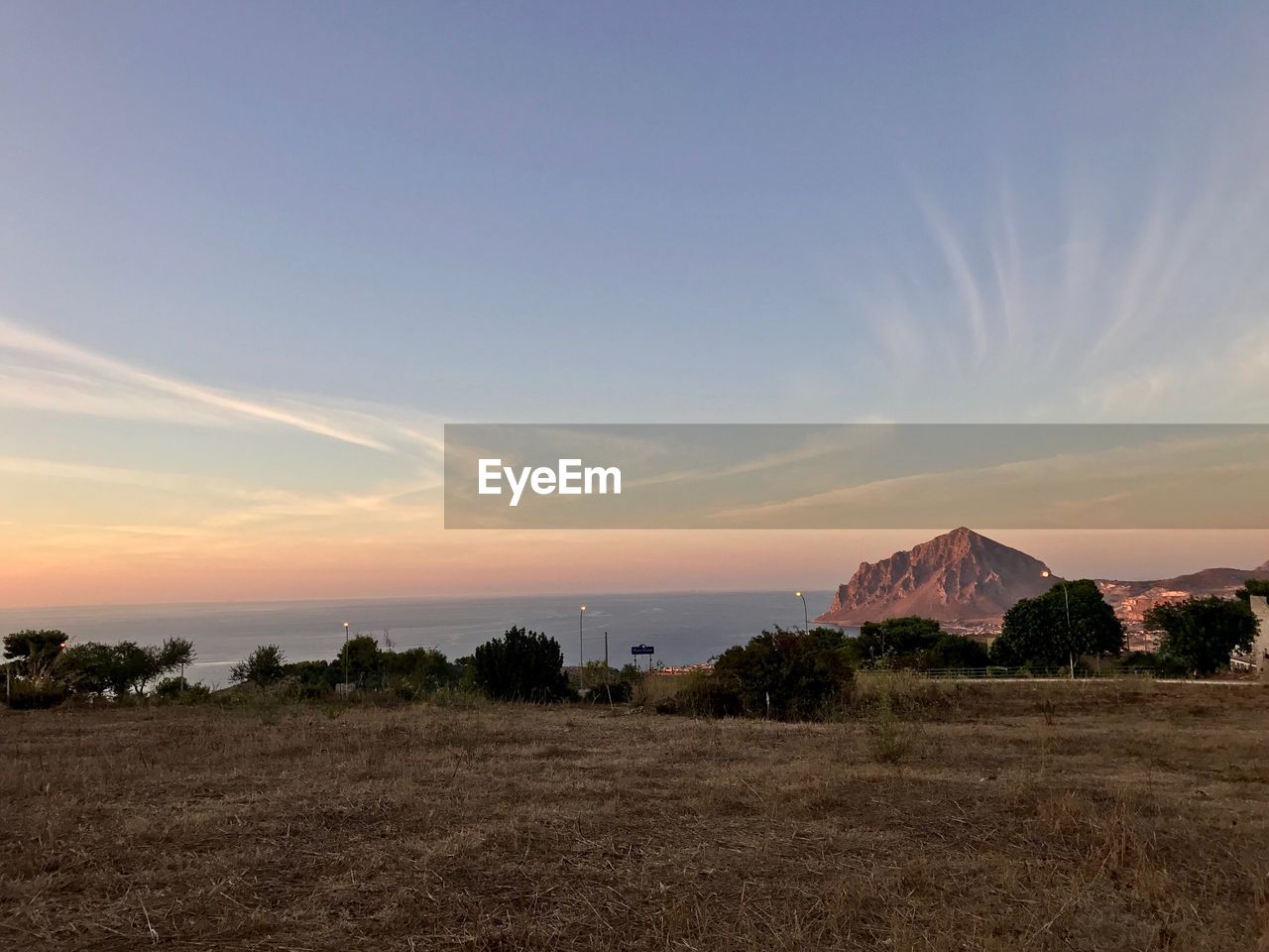 PANORAMIC VIEW OF FIELD AGAINST SKY