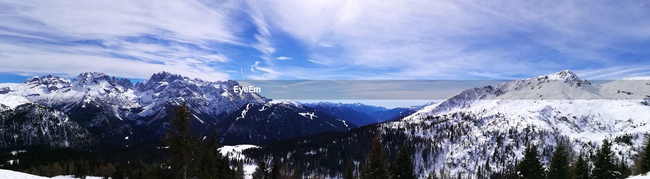 LOW ANGLE VIEW OF MOUNTAINS AGAINST SKY