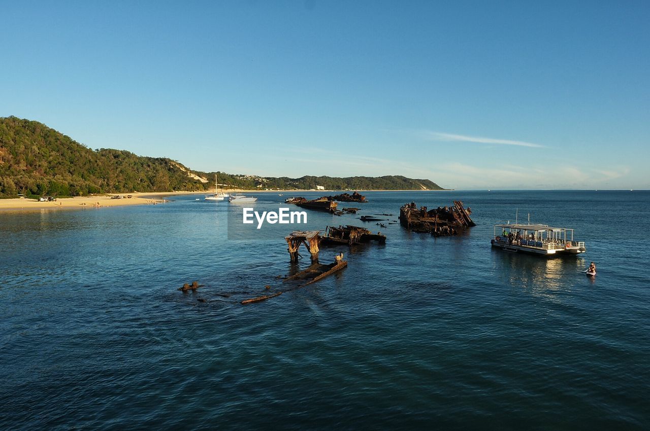 High angle view of boat on sea against sky