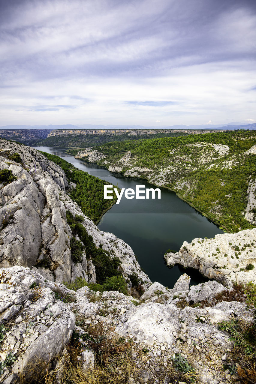 Scenic view of river against sky