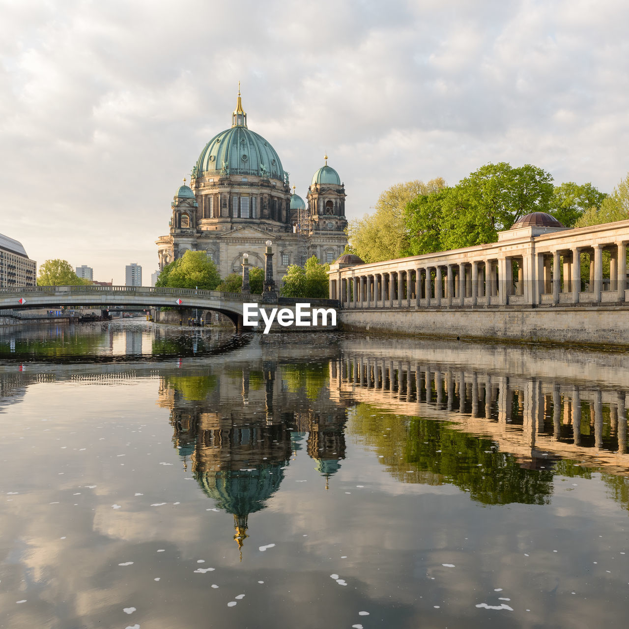 REFLECTION OF BUILDINGS IN WATER