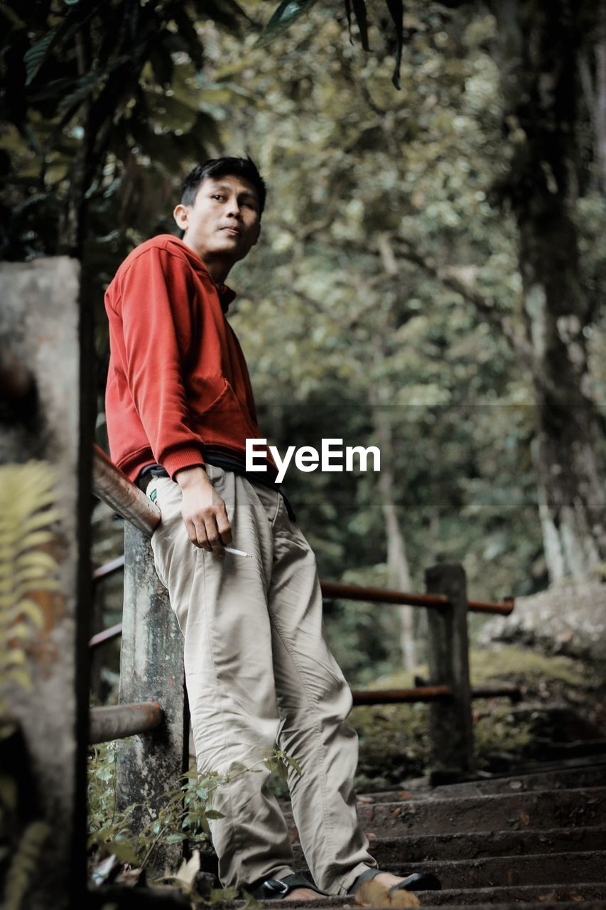 Man standing on chair