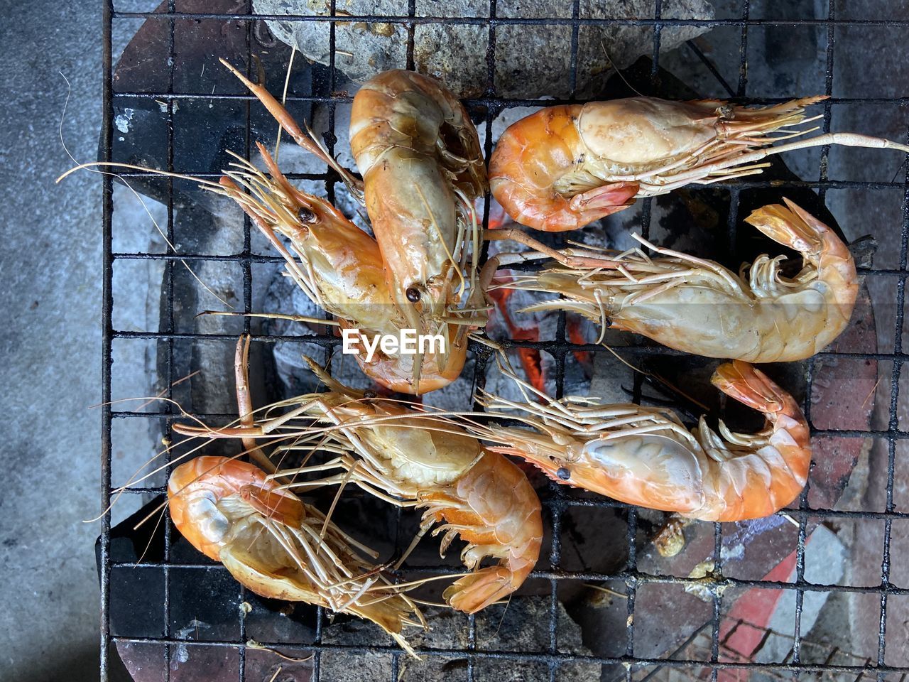 High angle view of meat on barbecue