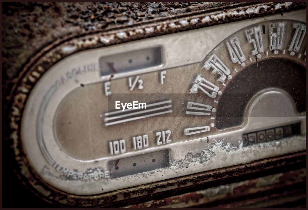 Close-up of abandoned car speedometer