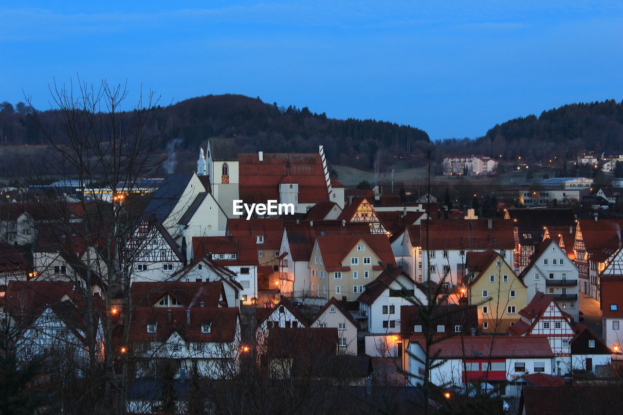 TOWNSCAPE AGAINST SKY DURING WINTER