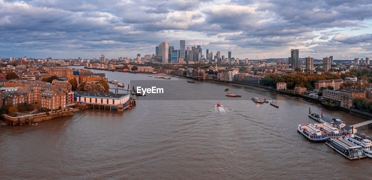 Aerial panoramic sunset view of london tower bridge and the river thames