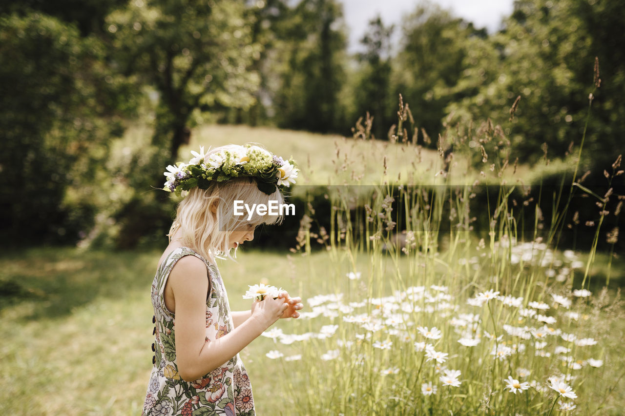 Girl wearing flower wreath