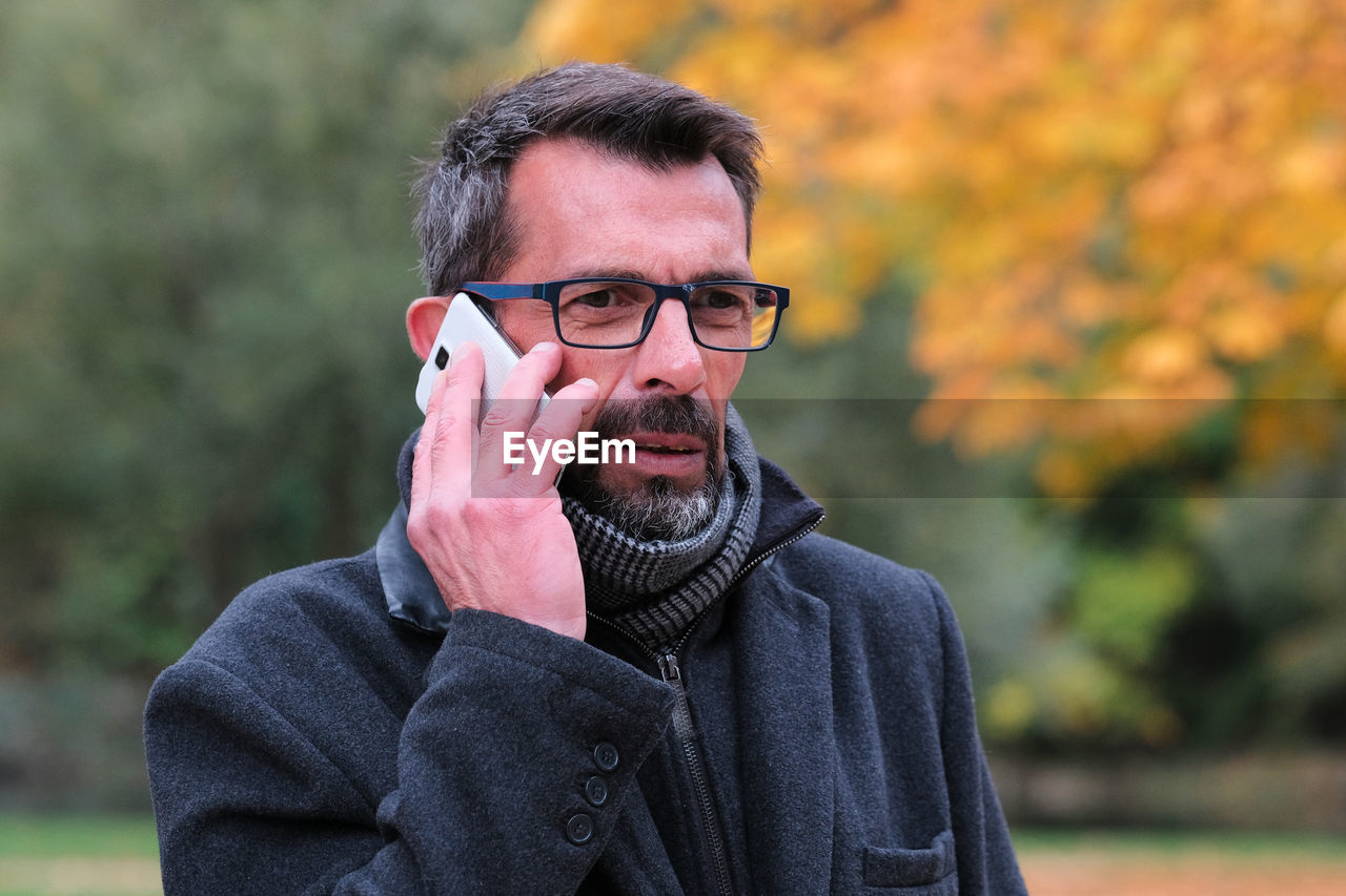 Portrait of man wearing eyeglasses