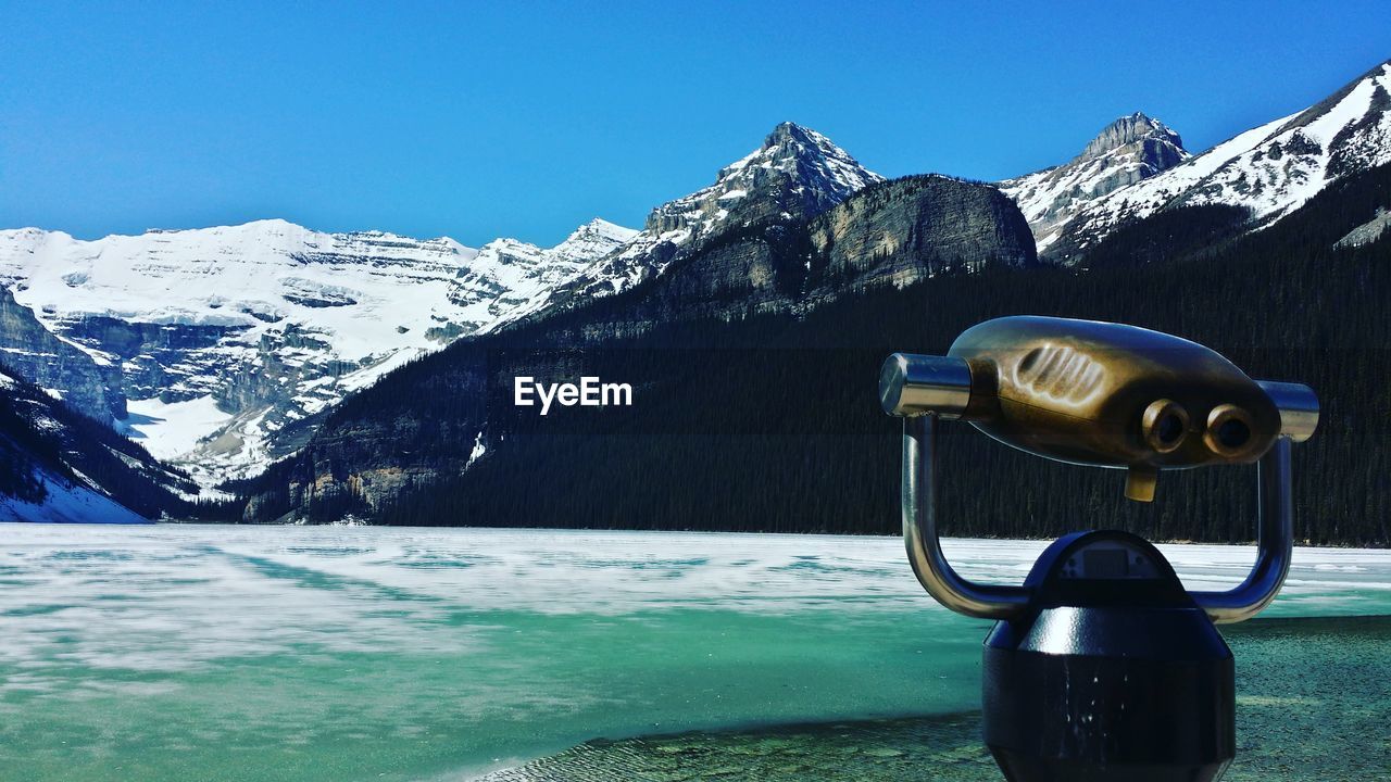 Scenic view of snow covered mountains