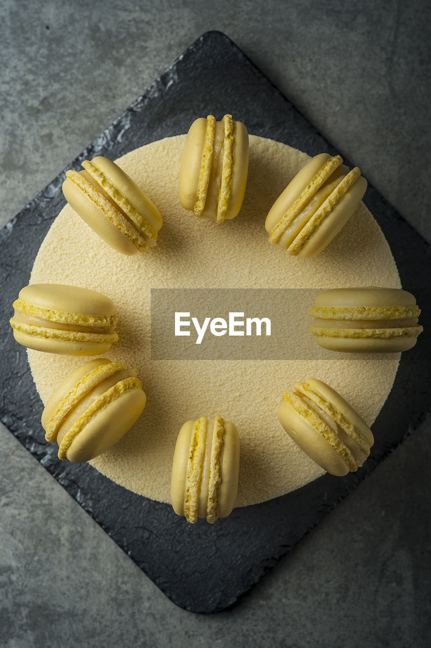 CLOSE-UP HIGH ANGLE VIEW OF YELLOW AND BREAD