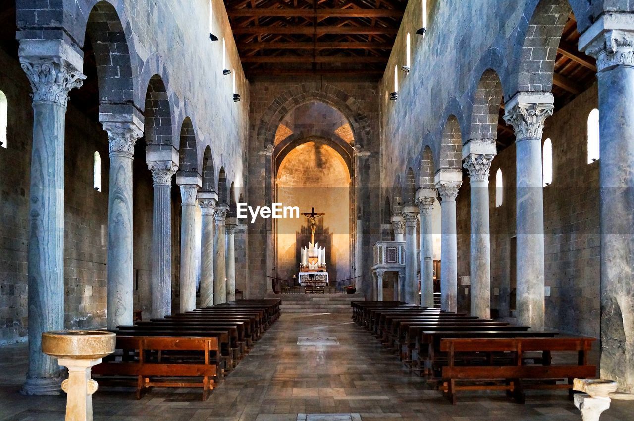 Empty benches in the church