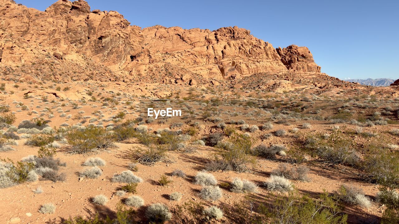 rock formations on landscape against sky