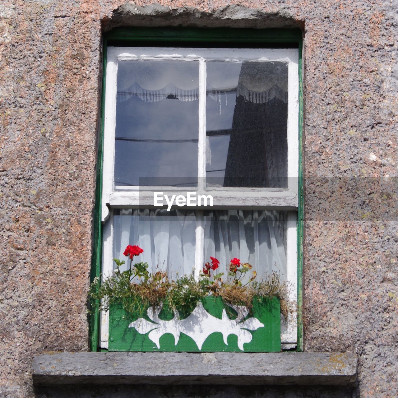 CLOSE-UP OF WINDOW ON BUILDING