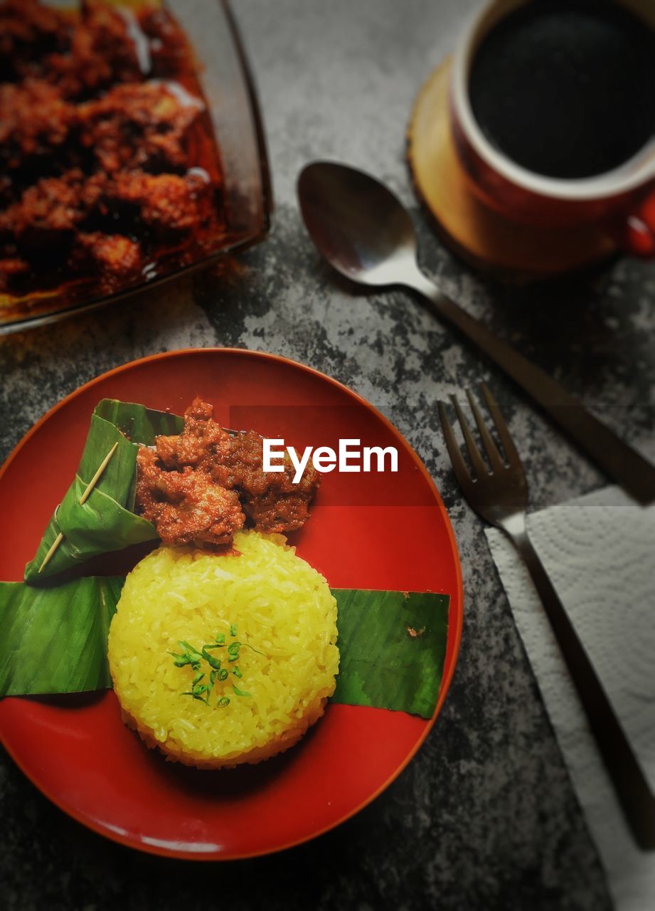 High angle view of breakfast served on table