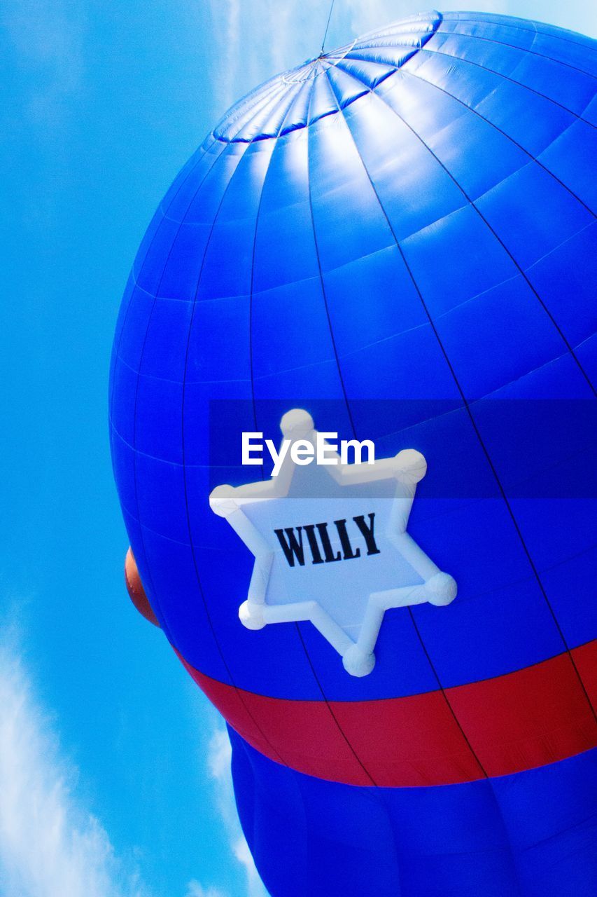 Low angle view of advertisement balloon