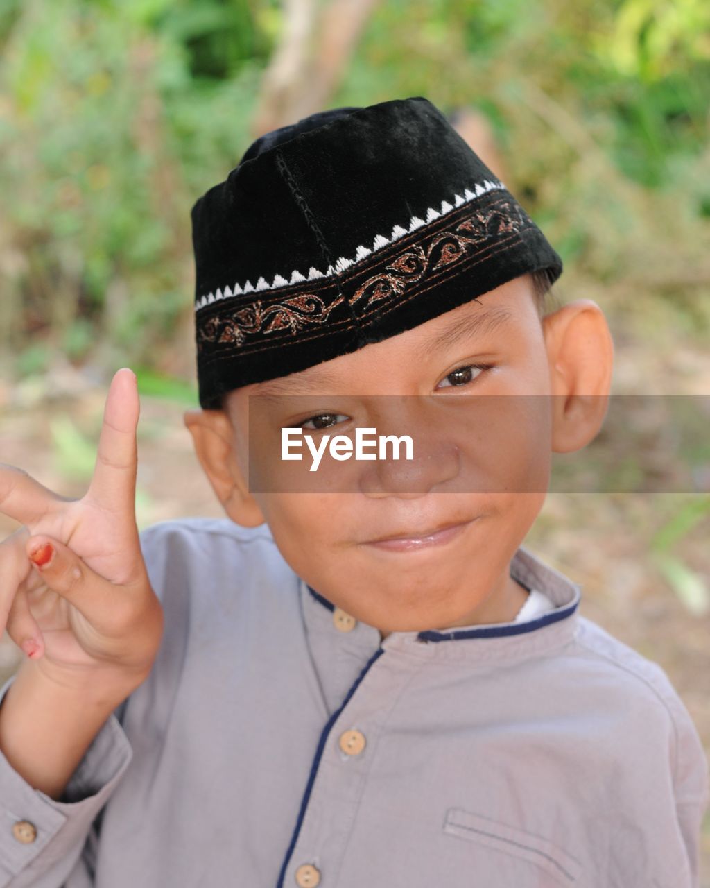 Portrait of smiling boy wearing hat