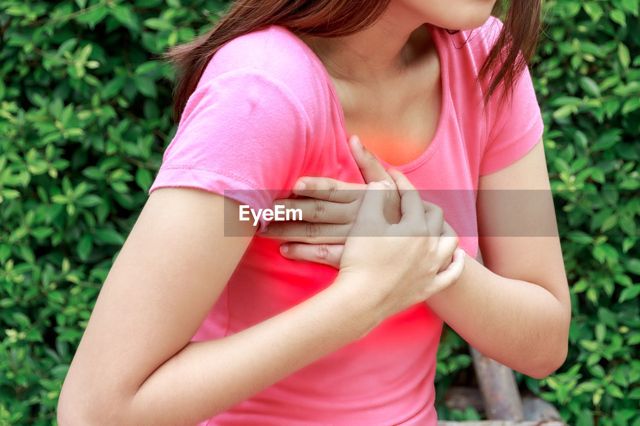 Digitally generated image of woman having chest pain